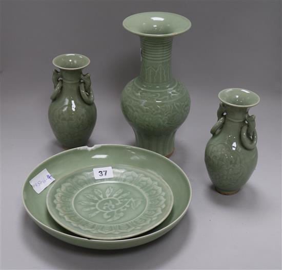 A group of Chinese celadon glazed porcelain vases and two dishes tallest vase 25cm